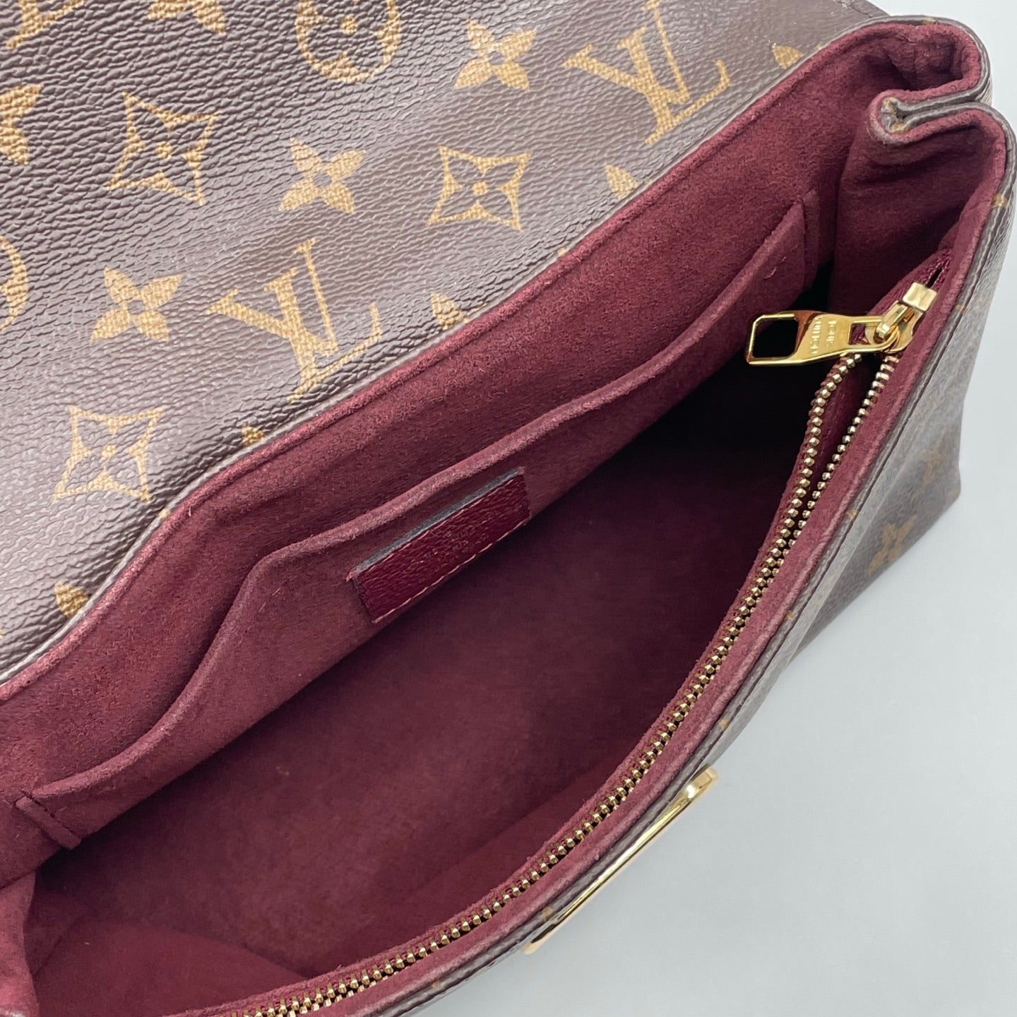 Louis Vuitton Saint Placide Monogram Handbag in Bordeaux