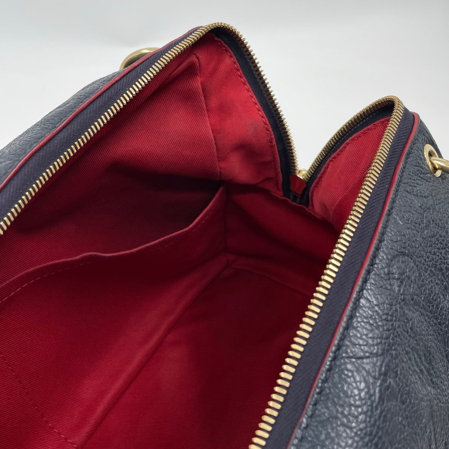 Louis Vuitton Ponthieu PM Monogram Empreinte in Marine Rouge