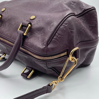 Louis Vuitton Speedy Bandoulière 25 Monogram Empreinte in Aubergine