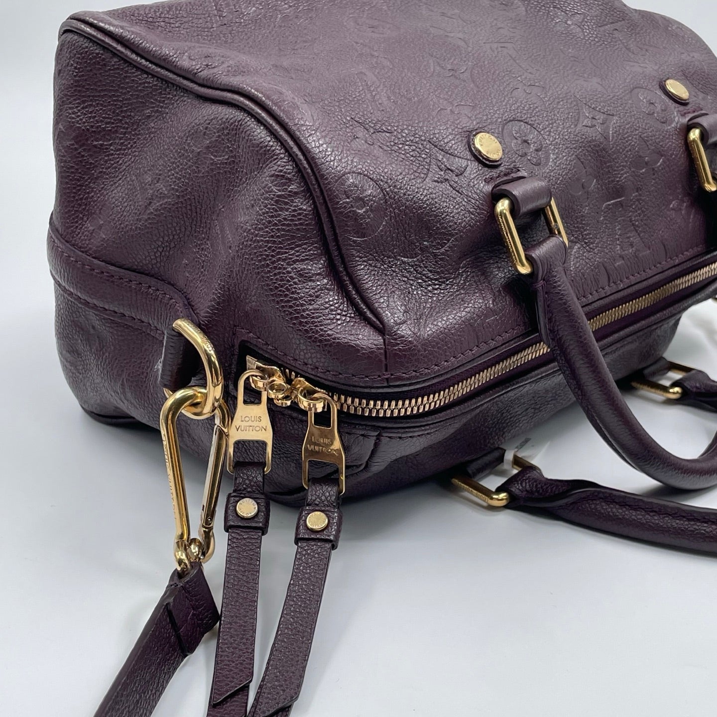Louis Vuitton Speedy Bandoulière 25 Monogram Empreinte in Aubergine