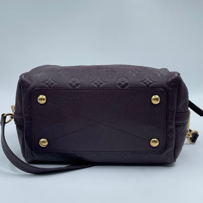 Louis Vuitton Speedy Bandoulière 25 Monogram Empreinte in Aubergine
