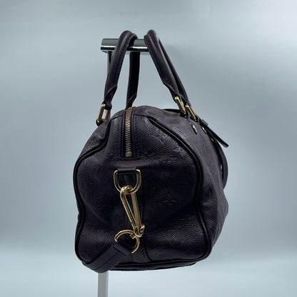 Louis Vuitton Speedy Bandoulière 25 Monogram Empreinte in Aubergine