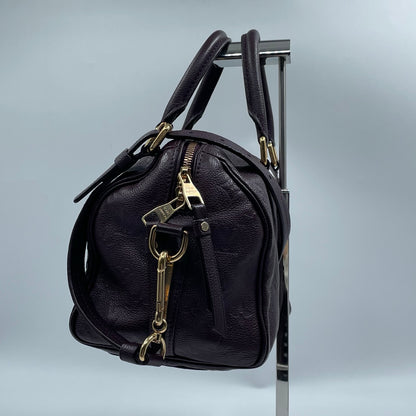 Louis Vuitton Speedy Bandoulière 25 Monogram Empreinte in Aubergine