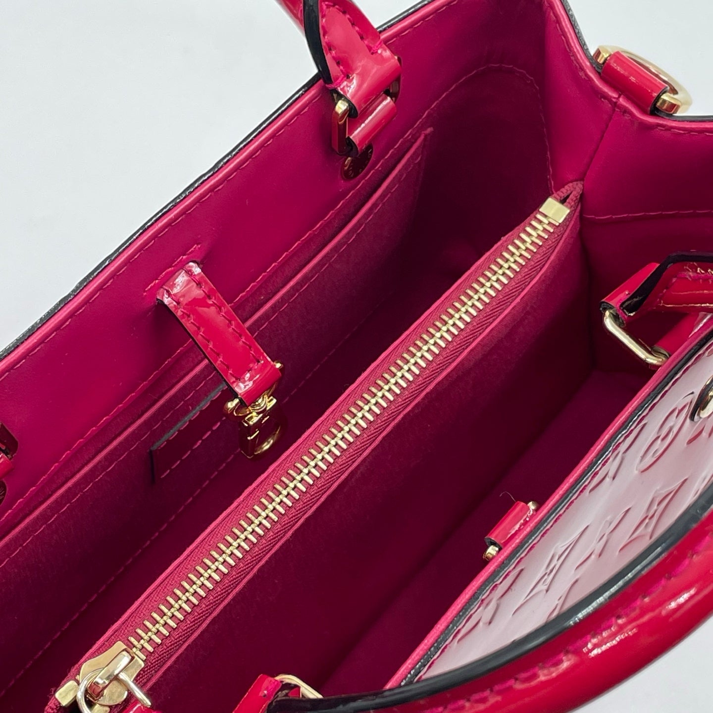 Louis Vuitton Montaigne BB Monogram Vernis in Magenta