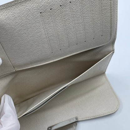 Louis Vuitton Epi Eugénie Wallet in Light Ivory