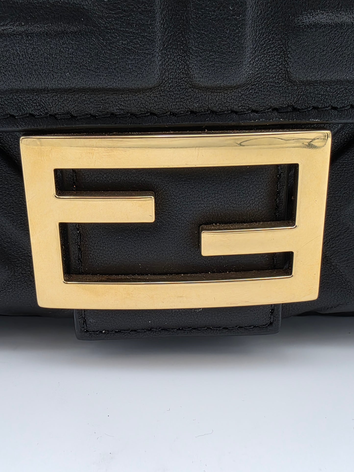 Fendi Baguette FF Motif Nappa Leather Bag in Black