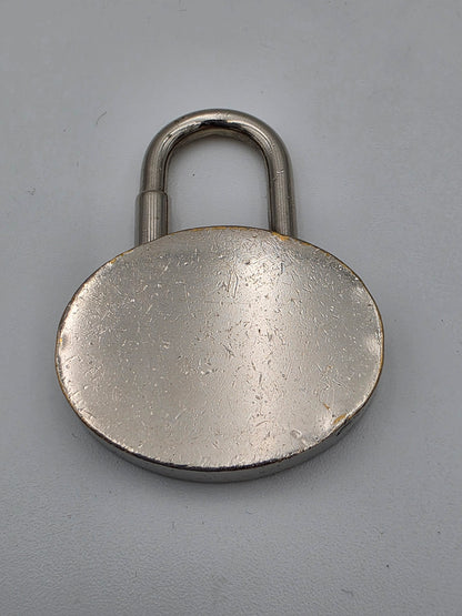 Hermès Vintage 2003 Année Méditerranée Cadena Lock Charm in Silver