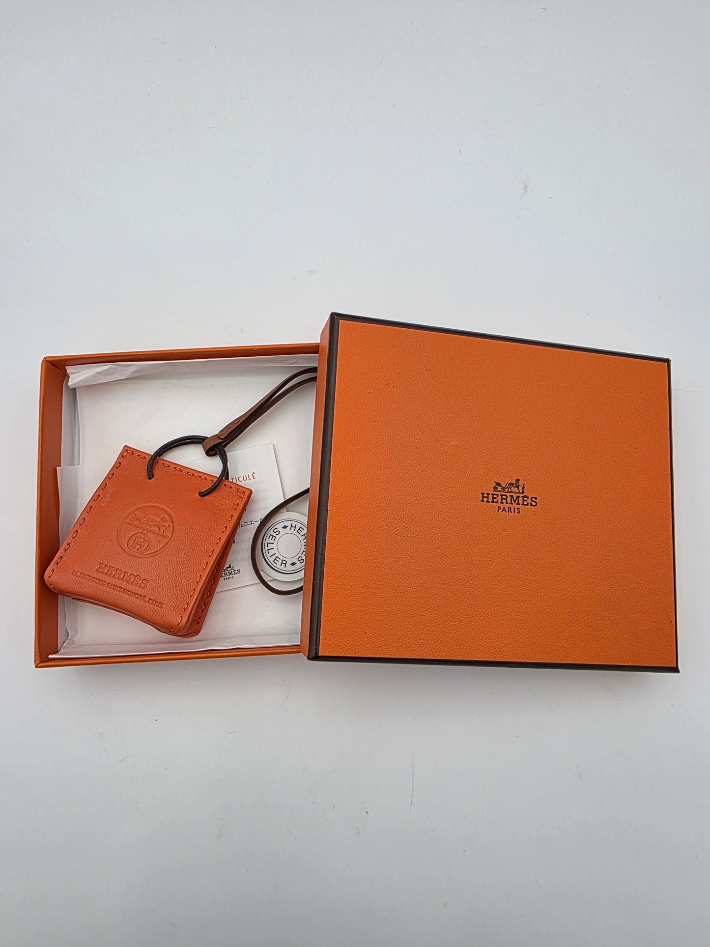 Hermès Milo Lambskin Shopping Bag Charm in Feu