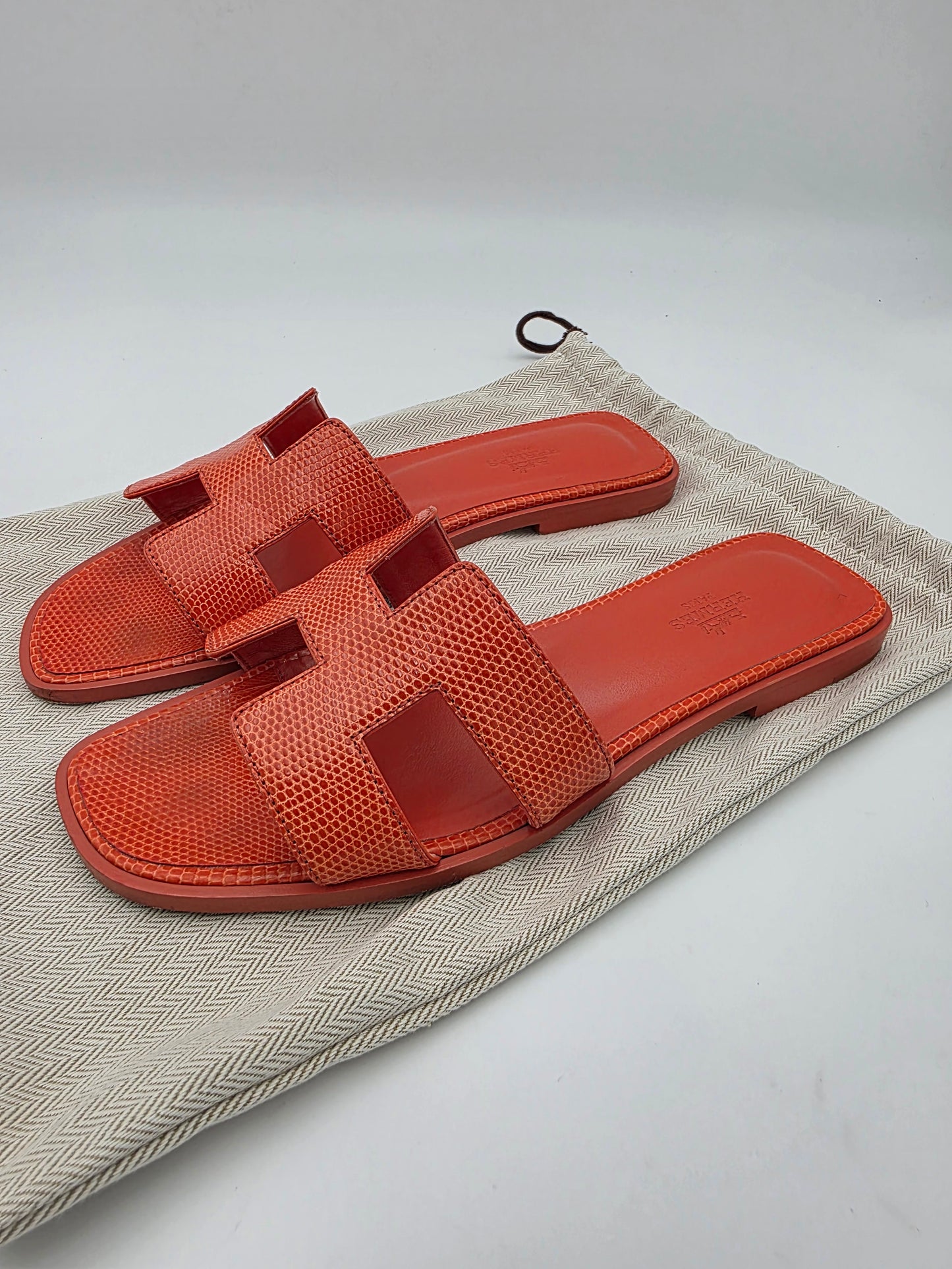 Hermès Oran Sandals in Orange Lizard Skin