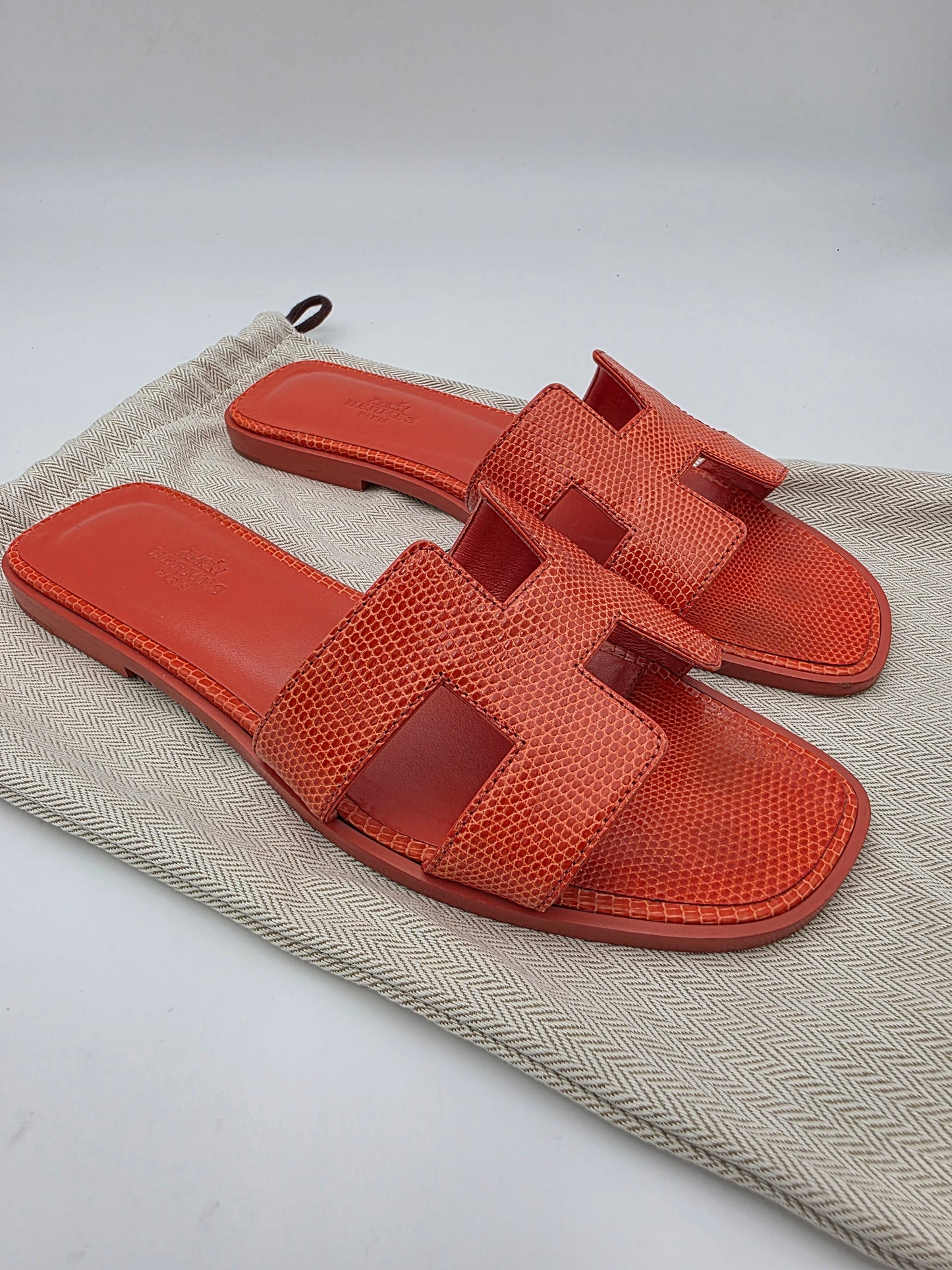 Hermès Oran Sandals in Orange Lizard Skin