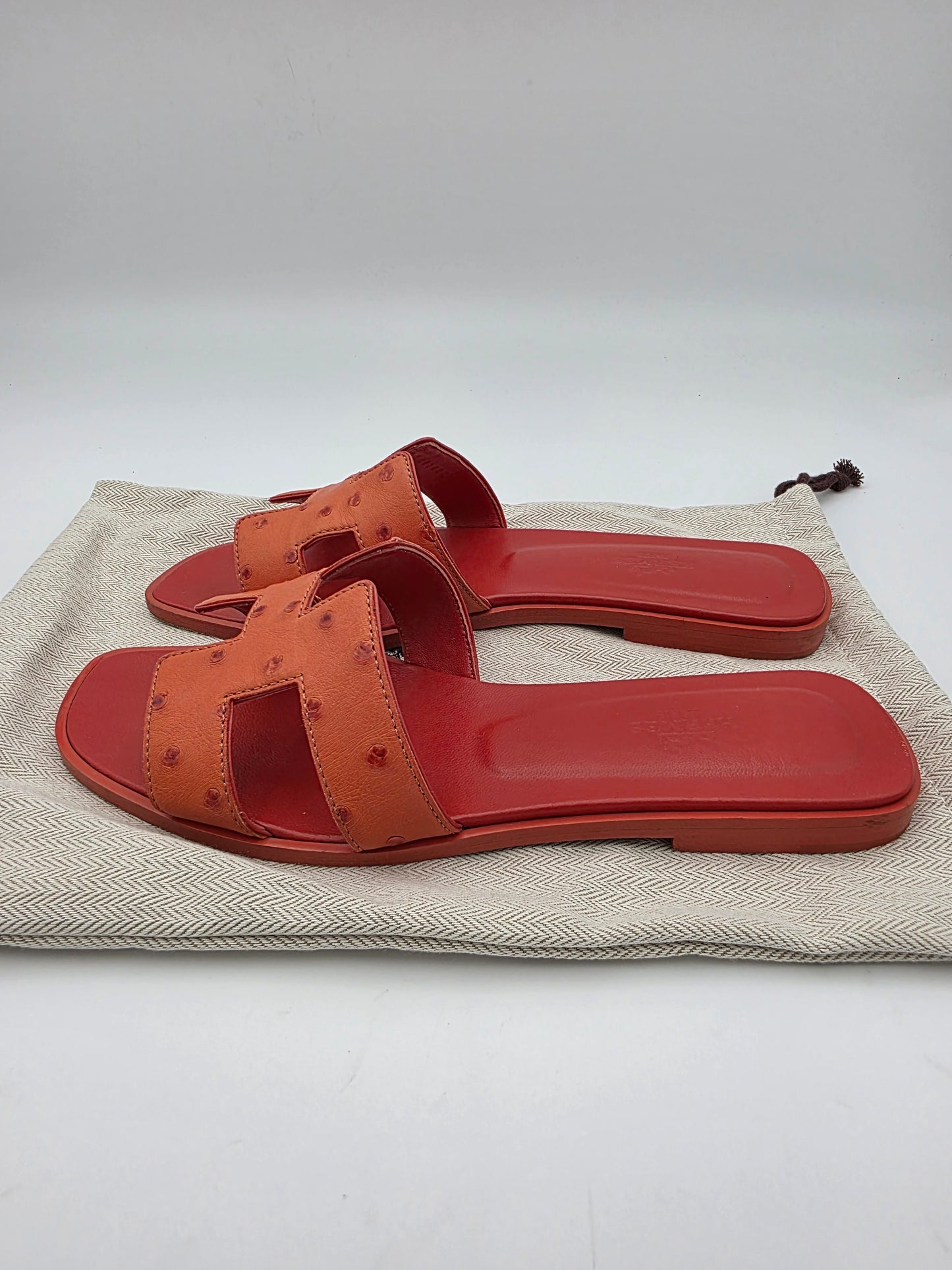 Hermès Oran Sandals in Orange Ostrich