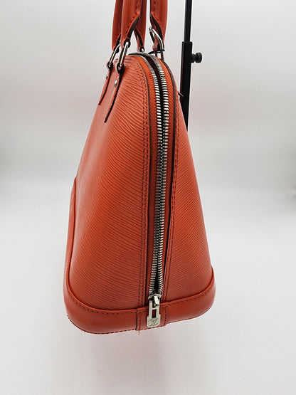 Louis Vuitton Alma PM Handbag In Piment Epi Leather