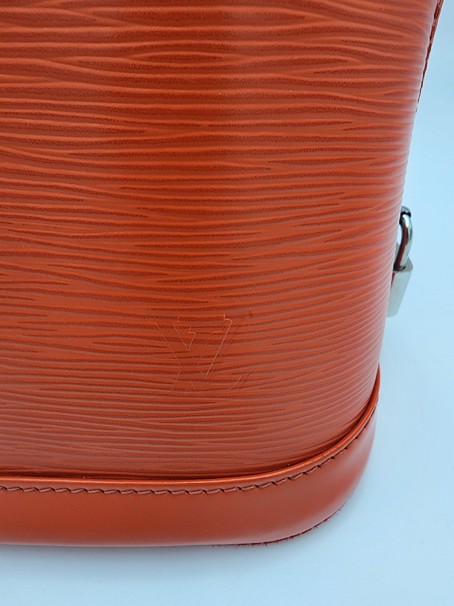 Louis Vuitton Alma PM Handbag In Piment Epi Leather