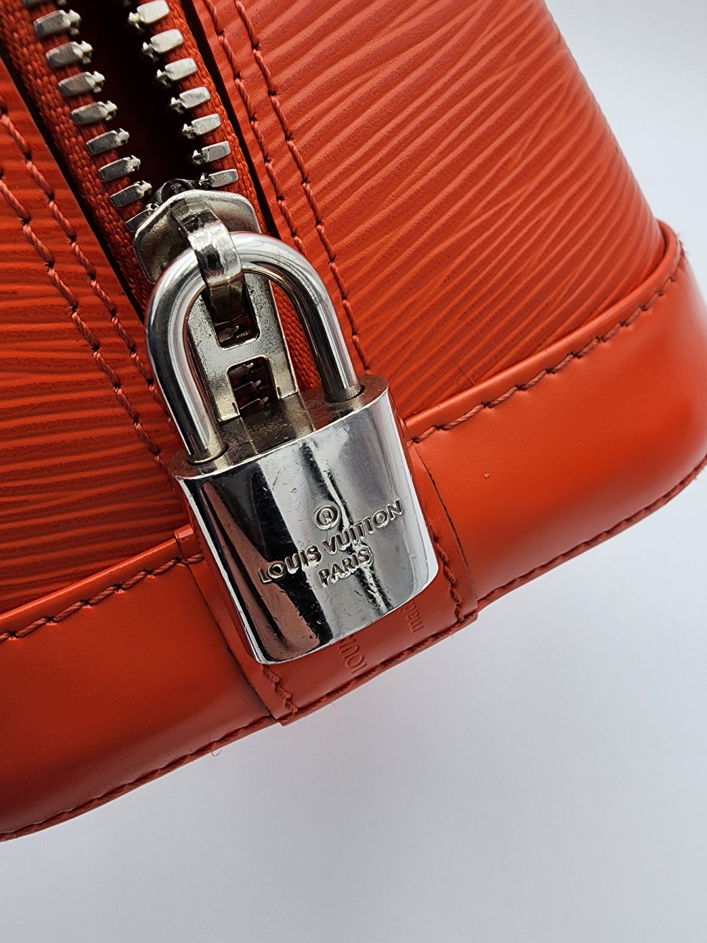 Louis Vuitton Alma PM Handbag In Piment Epi Leather