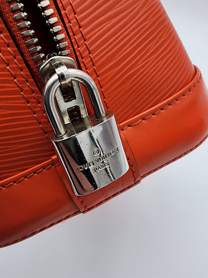 Louis Vuitton Alma PM Handbag In Piment Epi Leather