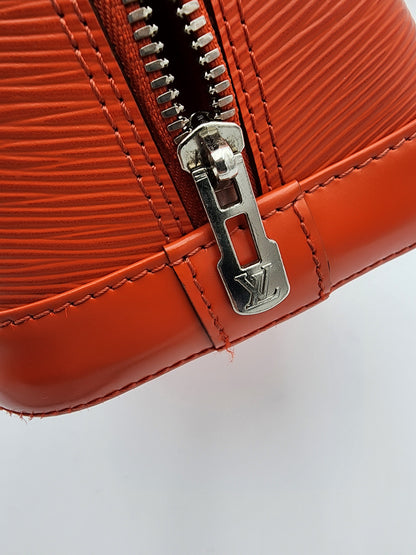 Louis Vuitton Alma PM Handbag In Piment Epi Leather