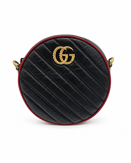 Gucci GG Marmont Mini Round Shoulder Bag In Black Matelasse Calfskin Leather With Red Piping