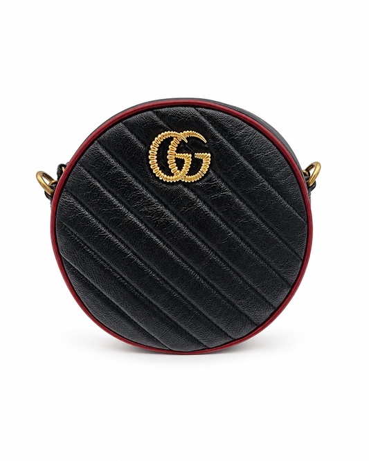 Gucci GG Marmont Mini Round Shoulder Bag In Black Matelasse Calfskin Leather With Red Piping