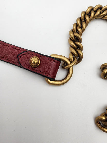 Gucci GG Marmont Mini Round Shoulder Bag In Black Matelasse Calfskin Leather With Red Piping