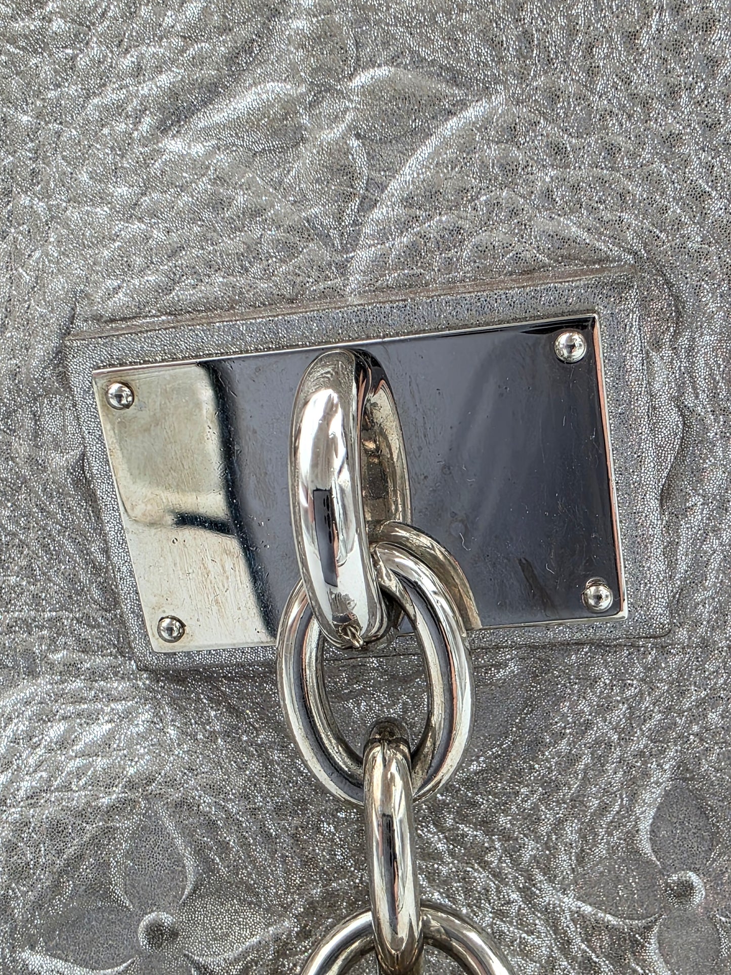 Louis Vuitton Comète Bag In Silver Shimmer Monogram Embossed Calfskin Leather