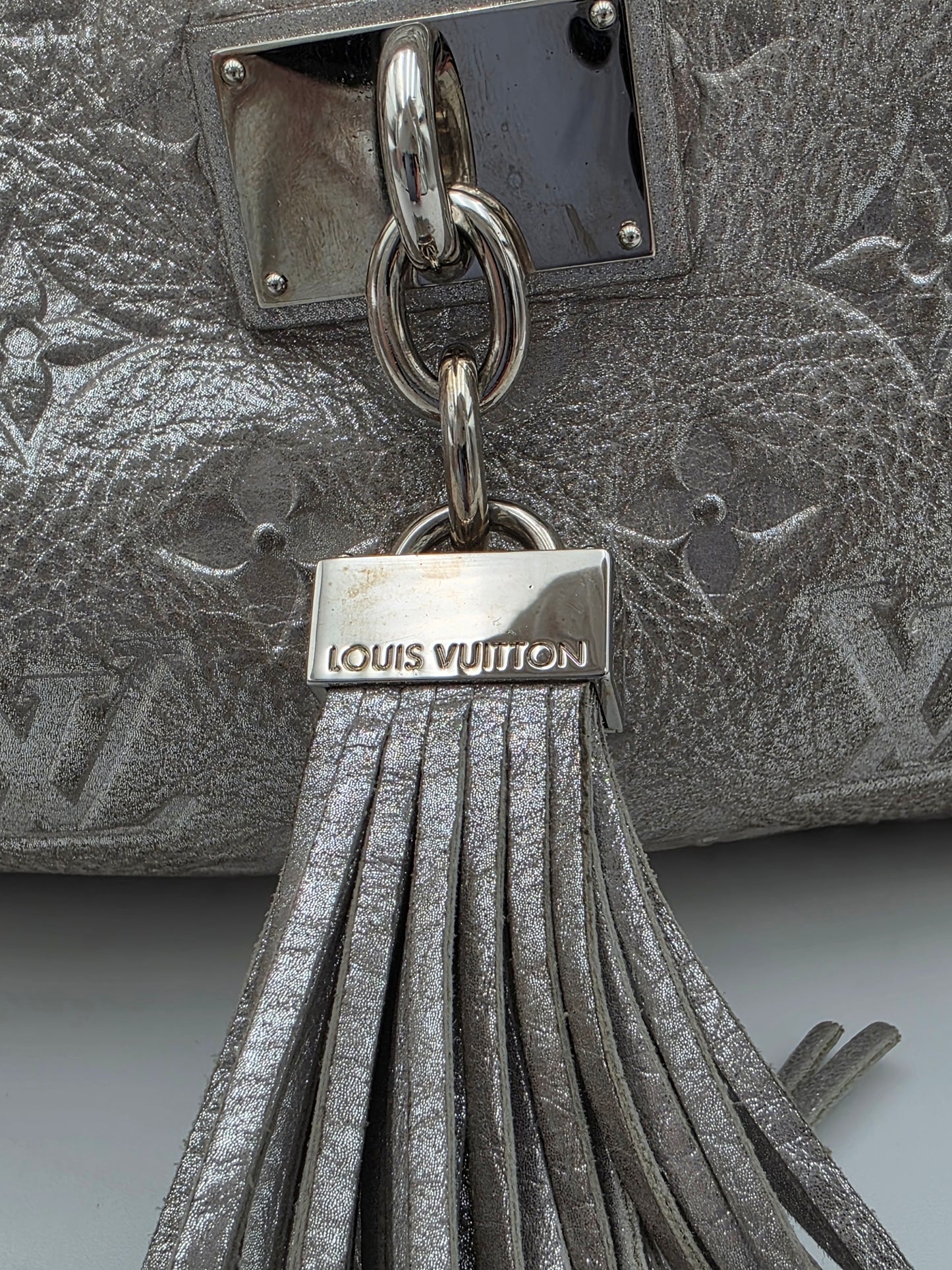 Louis Vuitton Comète Bag In Silver Shimmer Monogram Embossed Calfskin Leather
