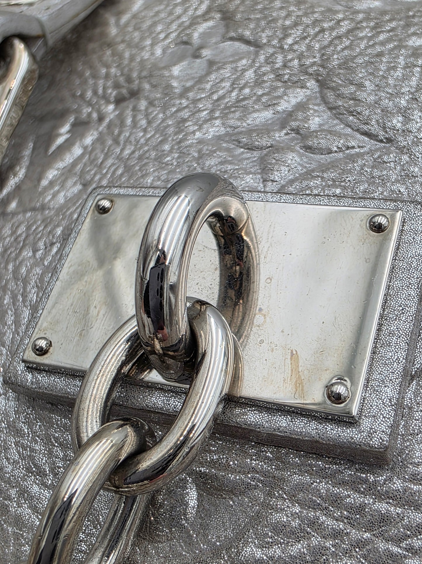 Louis Vuitton Comète Bag In Silver Shimmer Monogram Embossed Calfskin Leather