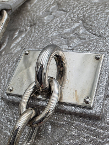 Louis Vuitton Comète Bag In Silver Shimmer Monogram Embossed Calfskin Leather