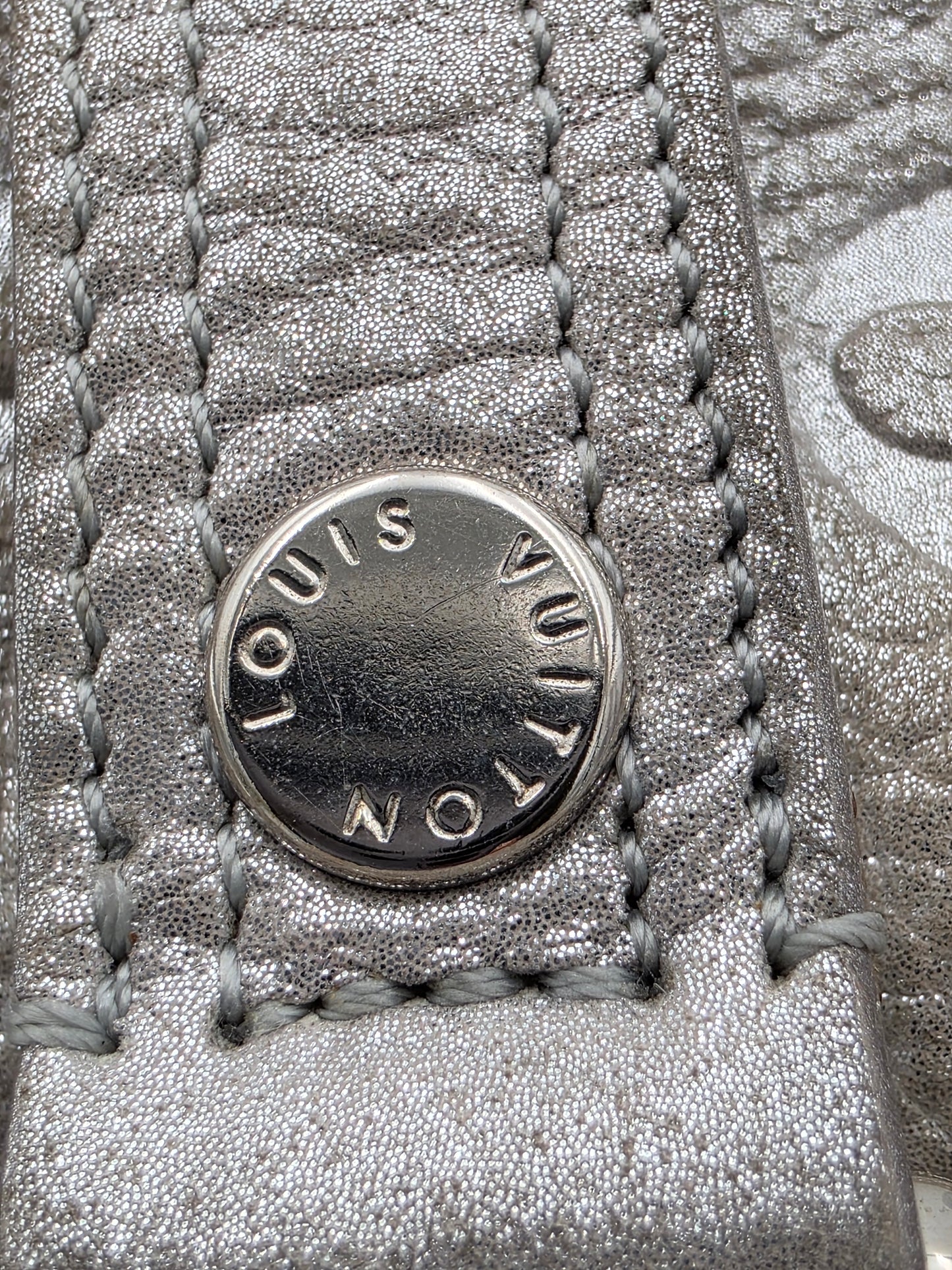 Louis Vuitton Comète Bag In Silver Shimmer Monogram Embossed Calfskin Leather
