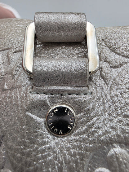 Louis Vuitton Comète Bag In Silver Shimmer Monogram Embossed Calfskin Leather