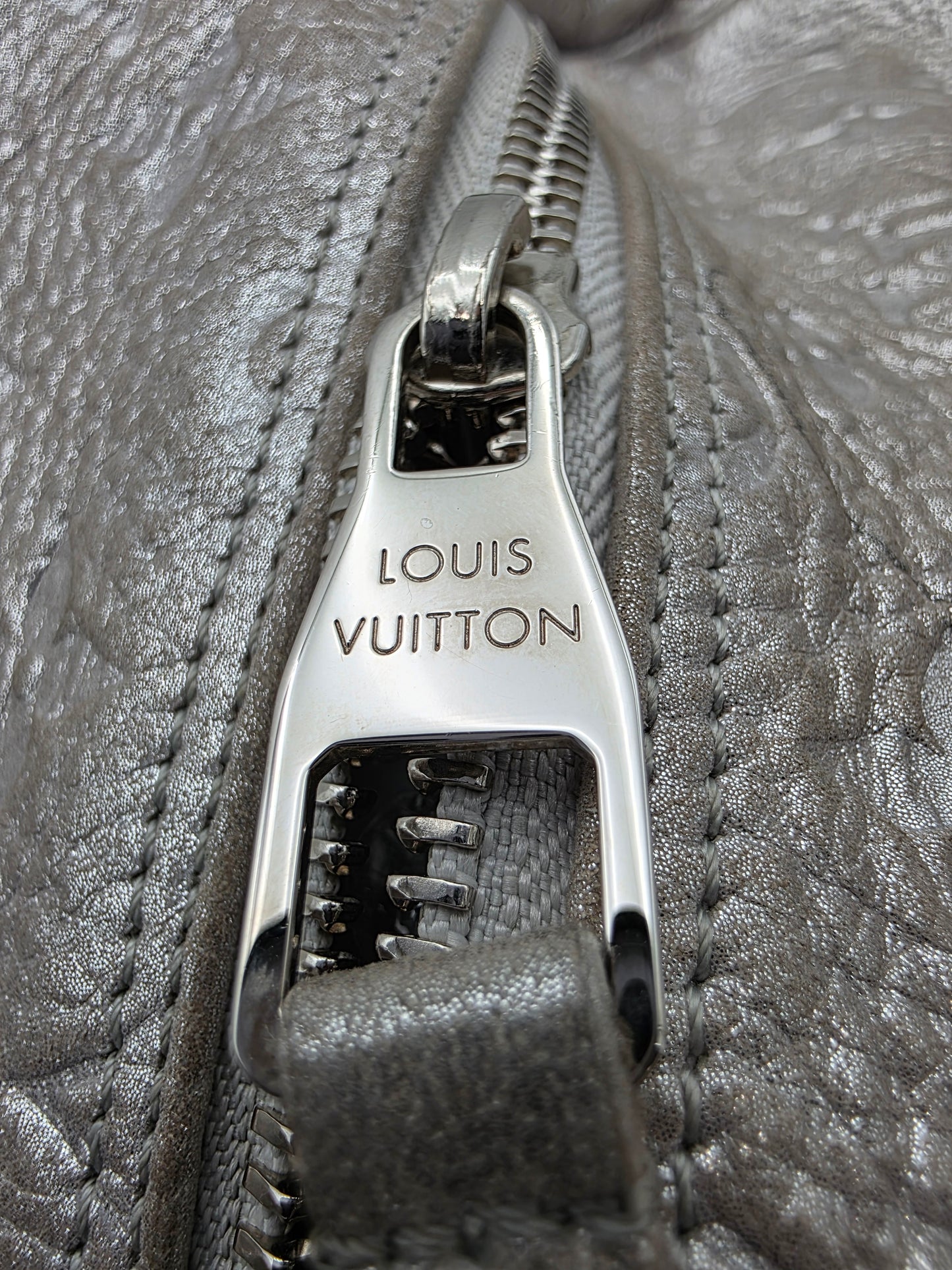 Louis Vuitton Comète Bag In Silver Shimmer Monogram Embossed Calfskin Leather