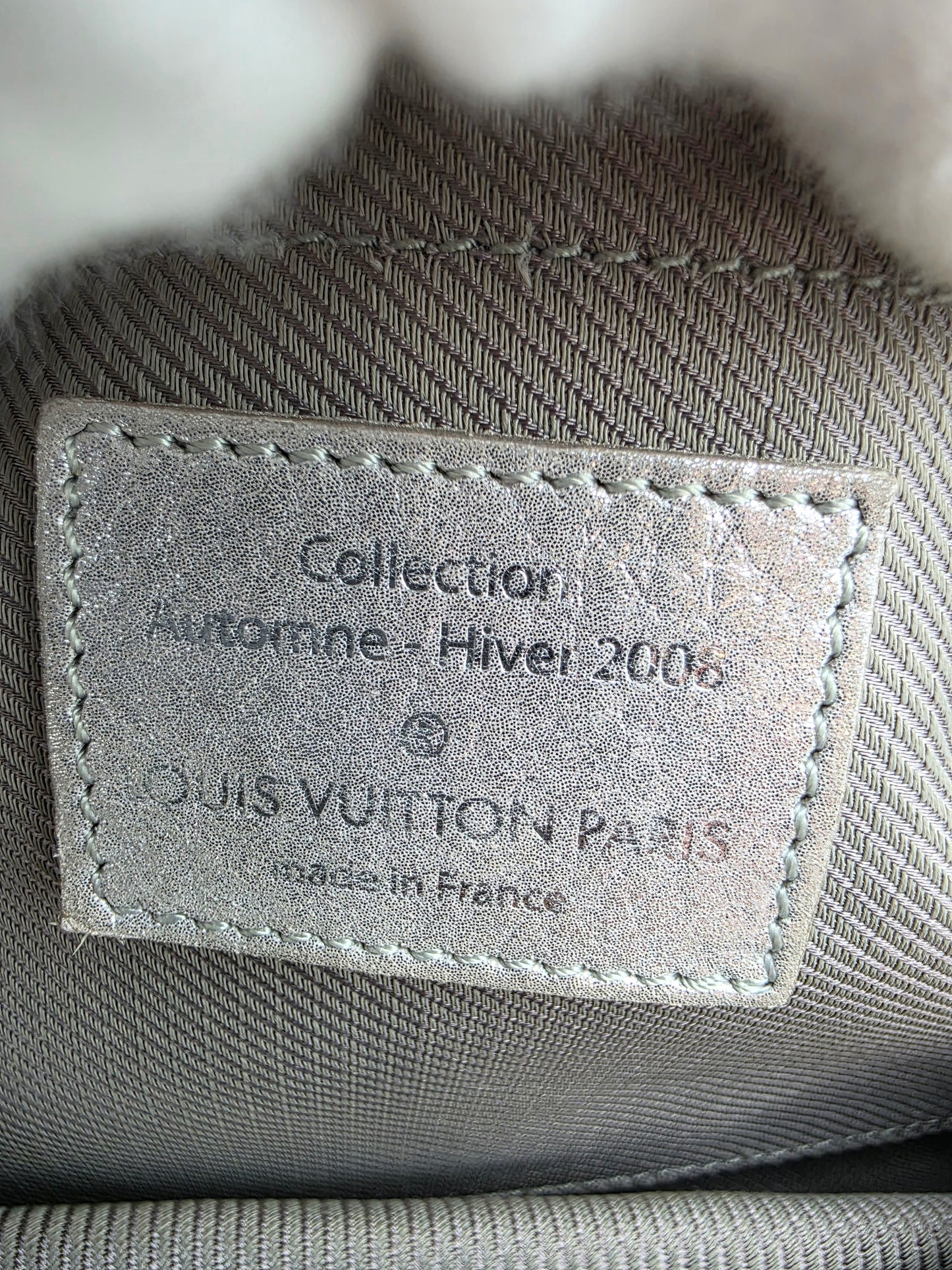 Louis Vuitton Comète Bag In Silver Shimmer Monogram Embossed Calfskin Leather