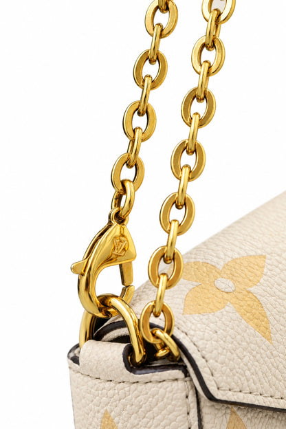 Louis Vuitton Monogram Giant Empreinte Pochette Félicie Cream/Saffron limited edition