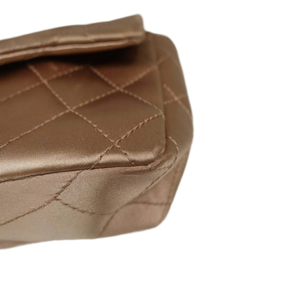CHANEL Limited Edition Gold Quilted Satin East West Single Flap Bag