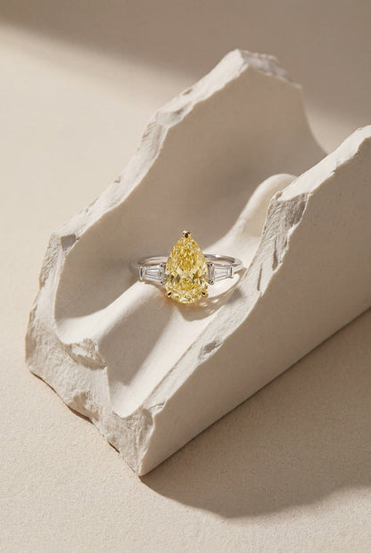 JANARY Pear Modified Brilliant 7.07-Carat Fancy Vivid Yellow Diamond Ring in 18K White Gold