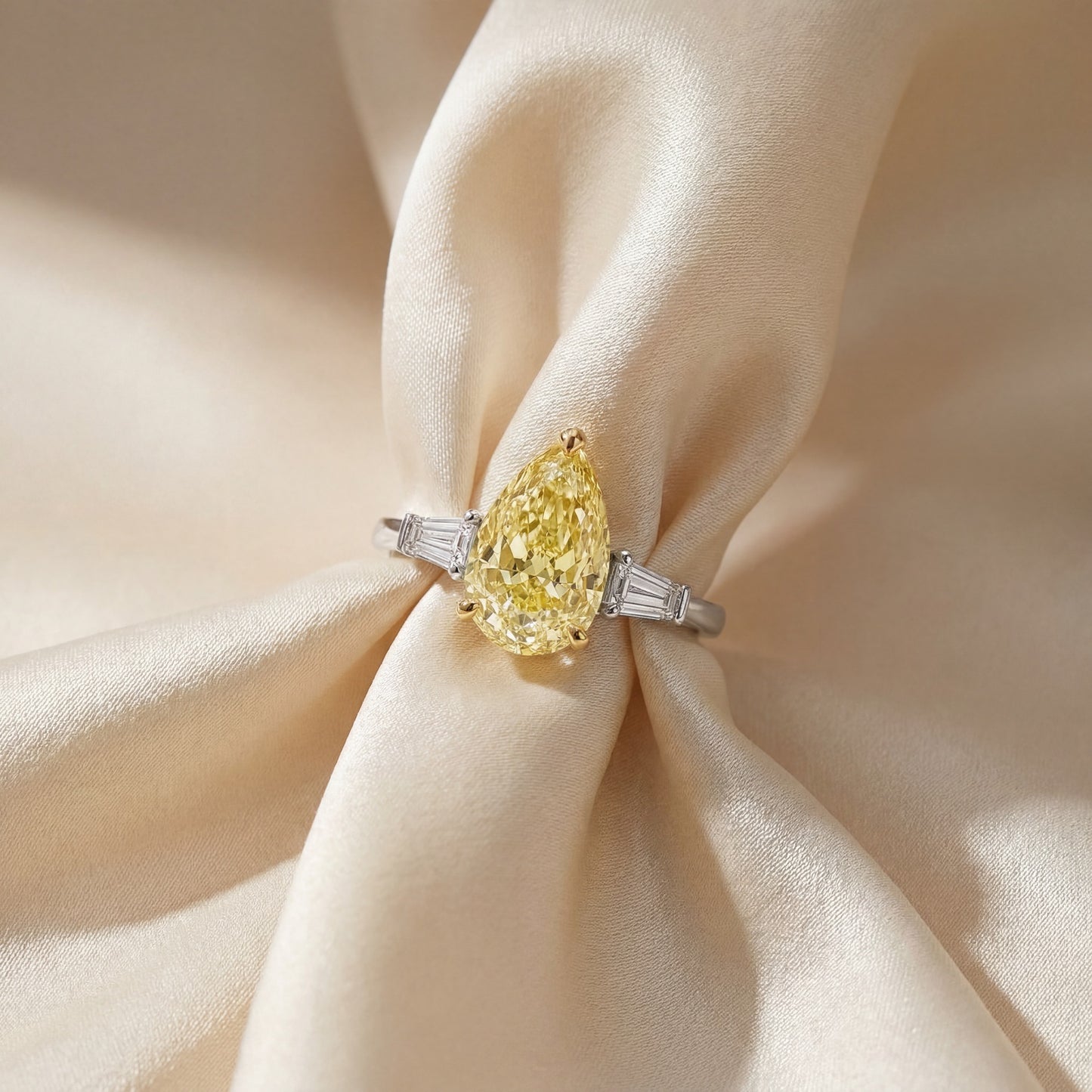 JANARY Pear Modified Brilliant 7.07-Carat Fancy Vivid Yellow Diamond Ring in 18K White Gold