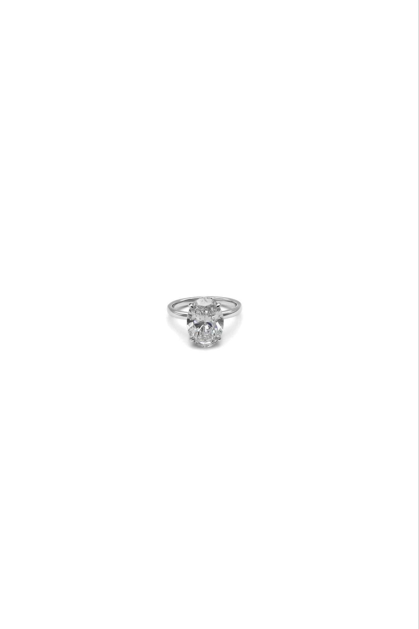 Oval Cut Diamond Ring in 14k White Gold