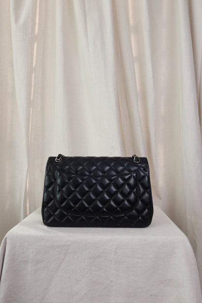 CHANEL Lambskin Quilted Jumbo Double Flap Bag in Navy Blue