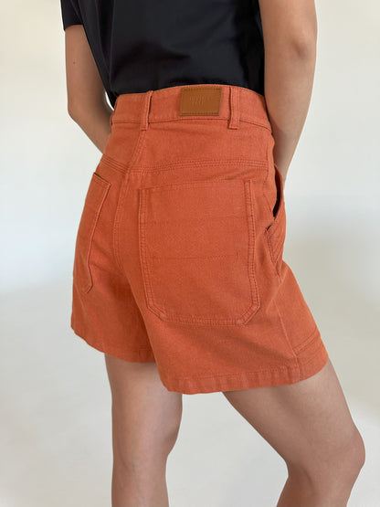 HERMES Stretch Denim Shorts in Orange