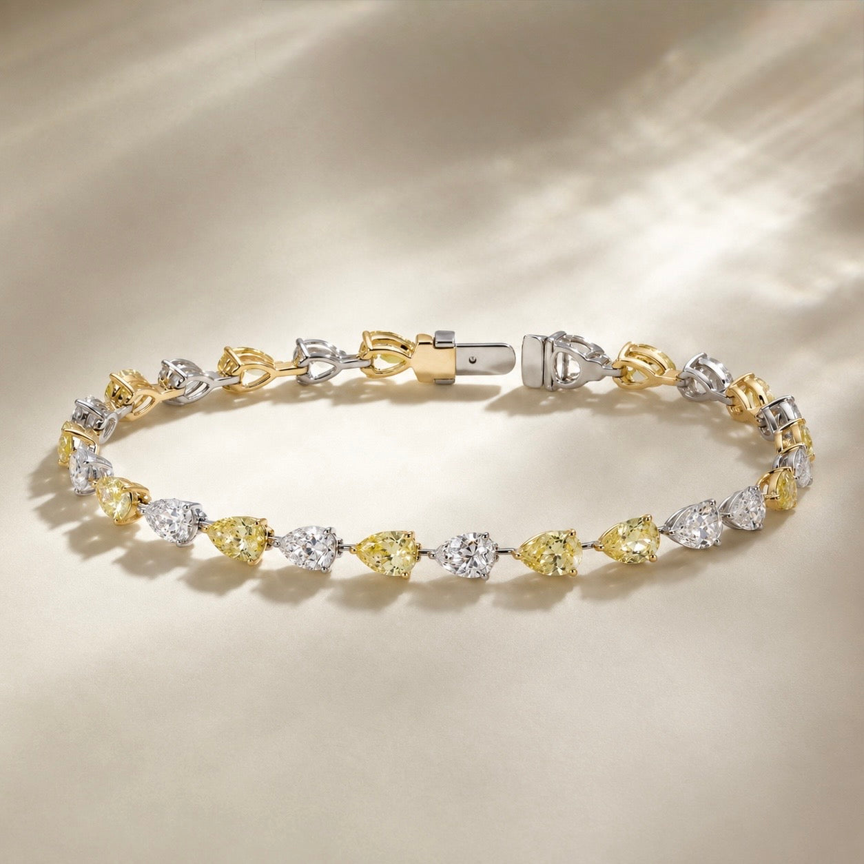 JANARY 8-Carat Pear White & Fancy Yellow Diamond Alternative Tennis Bracelet in 18K Gold