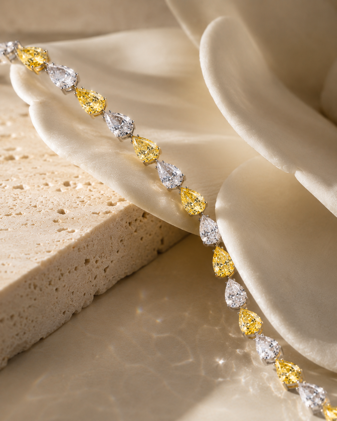 JANARY 8-Carat Pear White & Fancy Yellow Diamond Alternative Tennis Bracelet in 18K Gold