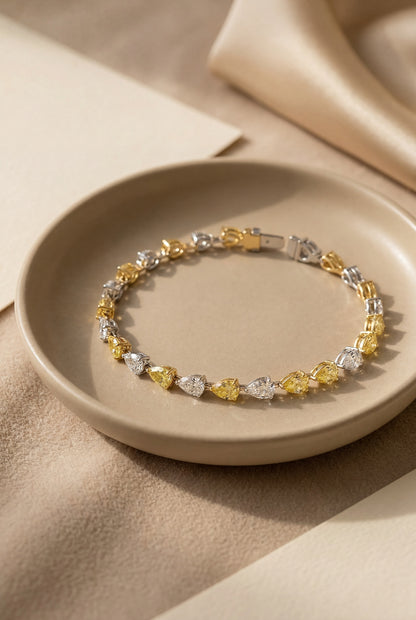 JANARY 8-Carat Pear White & Fancy Yellow Diamond Alternative Tennis Bracelet in 18K Gold