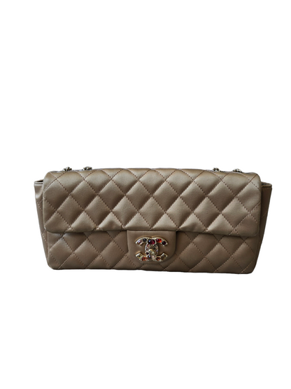 CHANEL Limited Edition Gold Quilted Satin East West Single Flap Bag