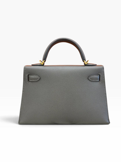 Hermès Mini Kelly in Graphite Madame Leather GHW