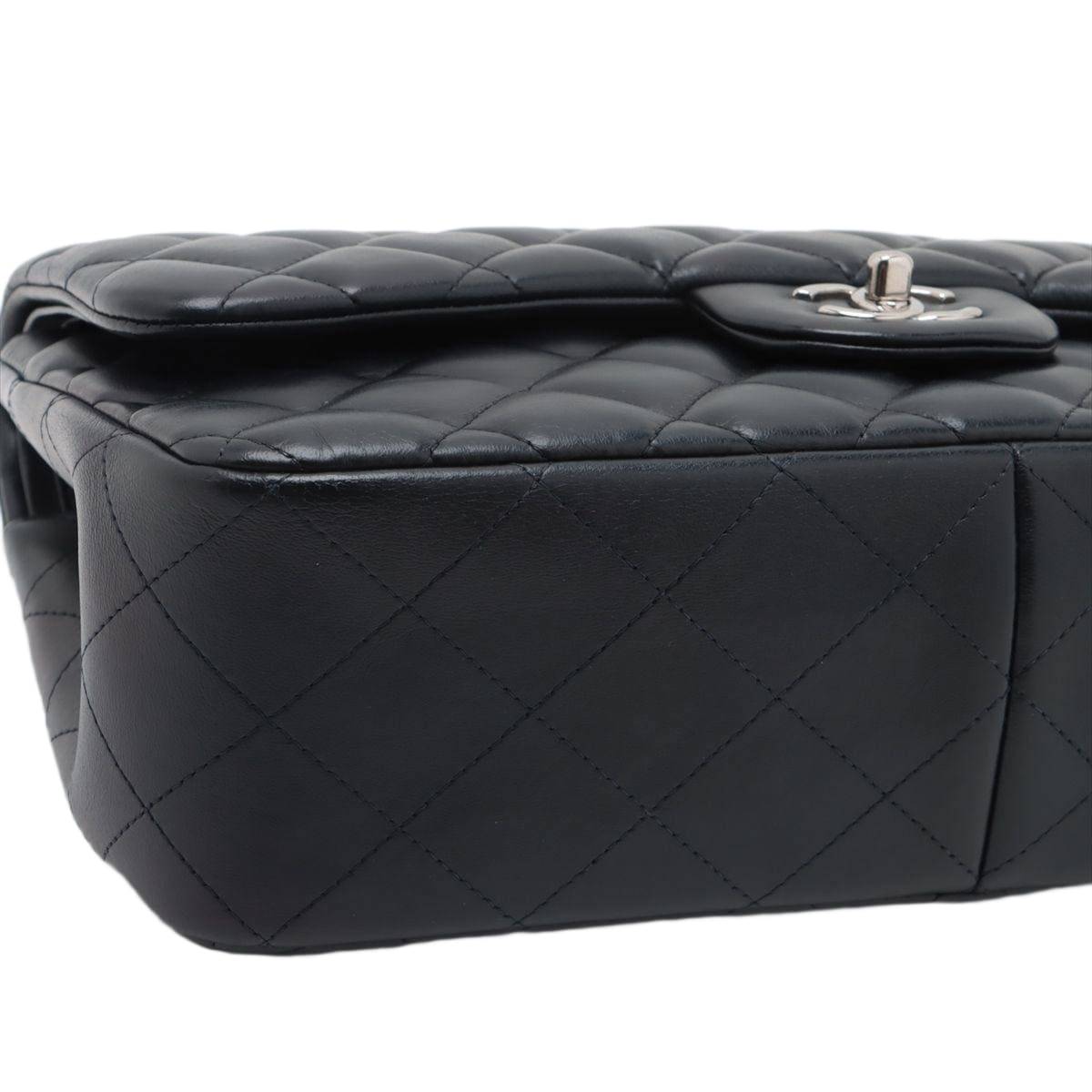 CHANEL Lambskin Quilted Jumbo Double Flap Bag in Navy Blue