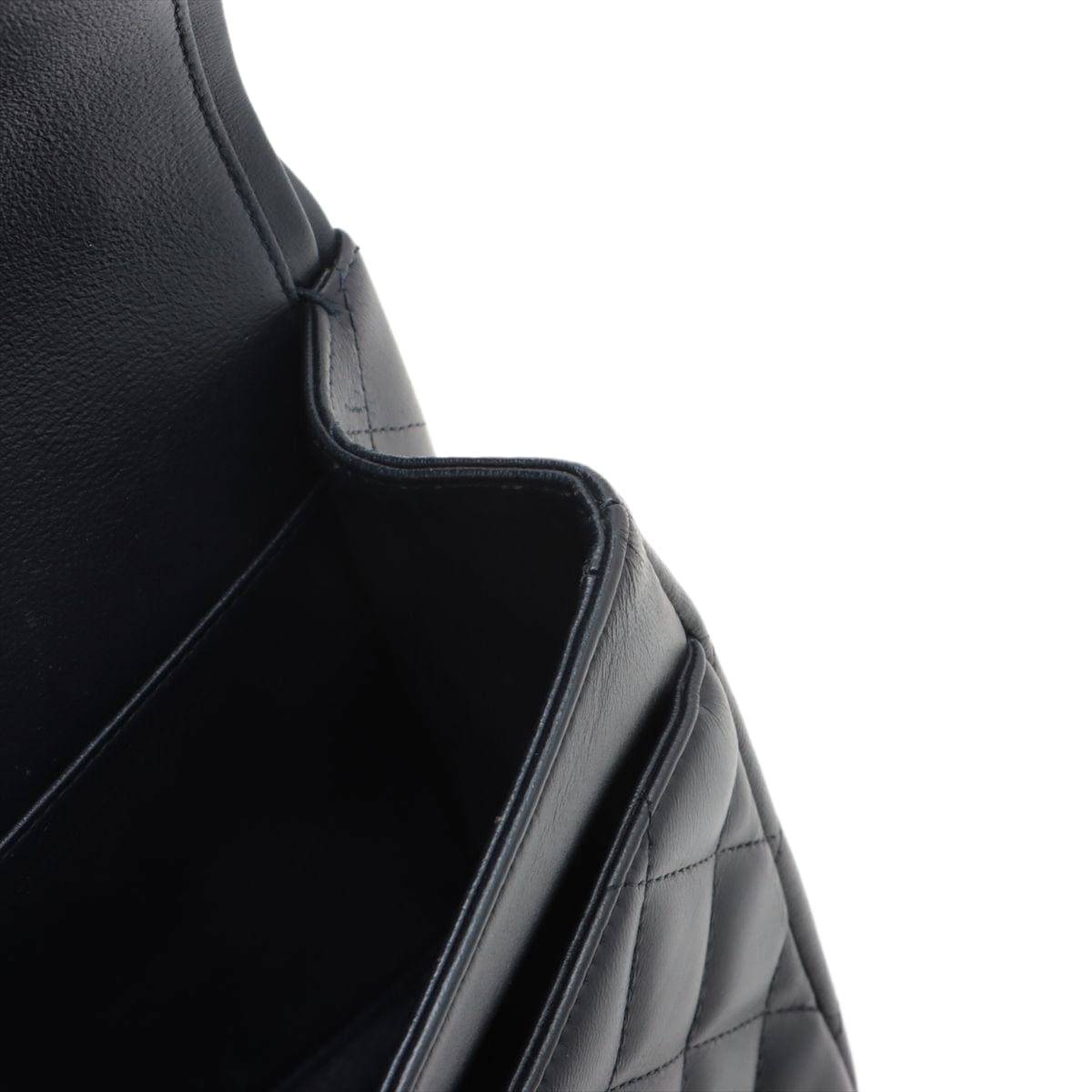 CHANEL Lambskin Quilted Jumbo Double Flap Bag in Navy Blue