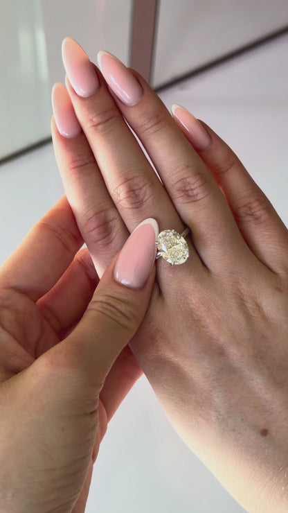 Oval Cut Diamond Ring in 14k White Gold