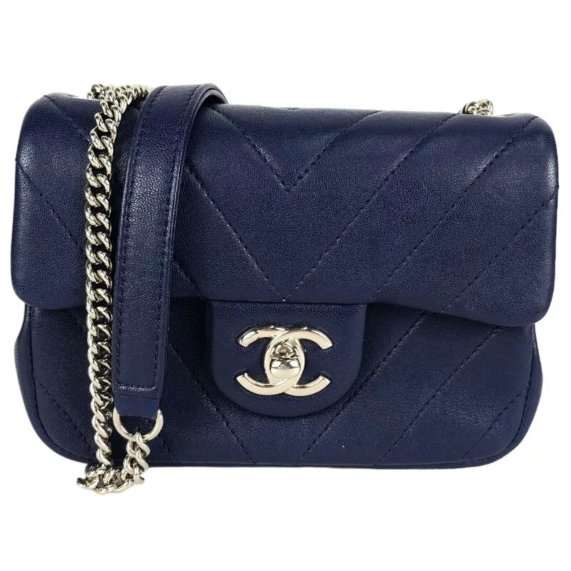 CHANEL Mini Chevron Shoulder Bag In Navy Lambskin with Silver Hardware