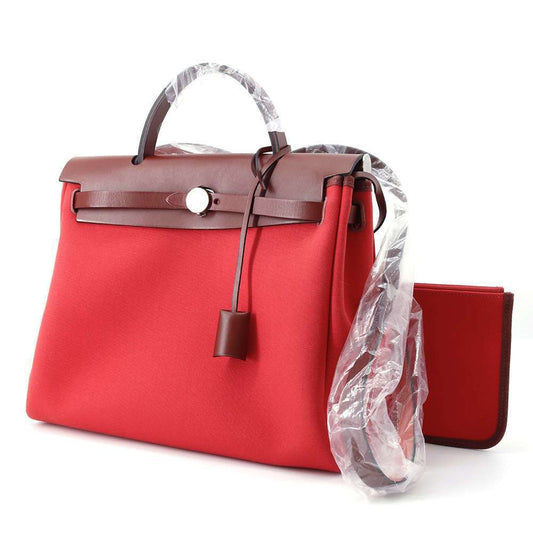 HERMES Herbag zip Size PM Toile Offiche / Vache Hunter Leather Rouge Piment/Rouge H