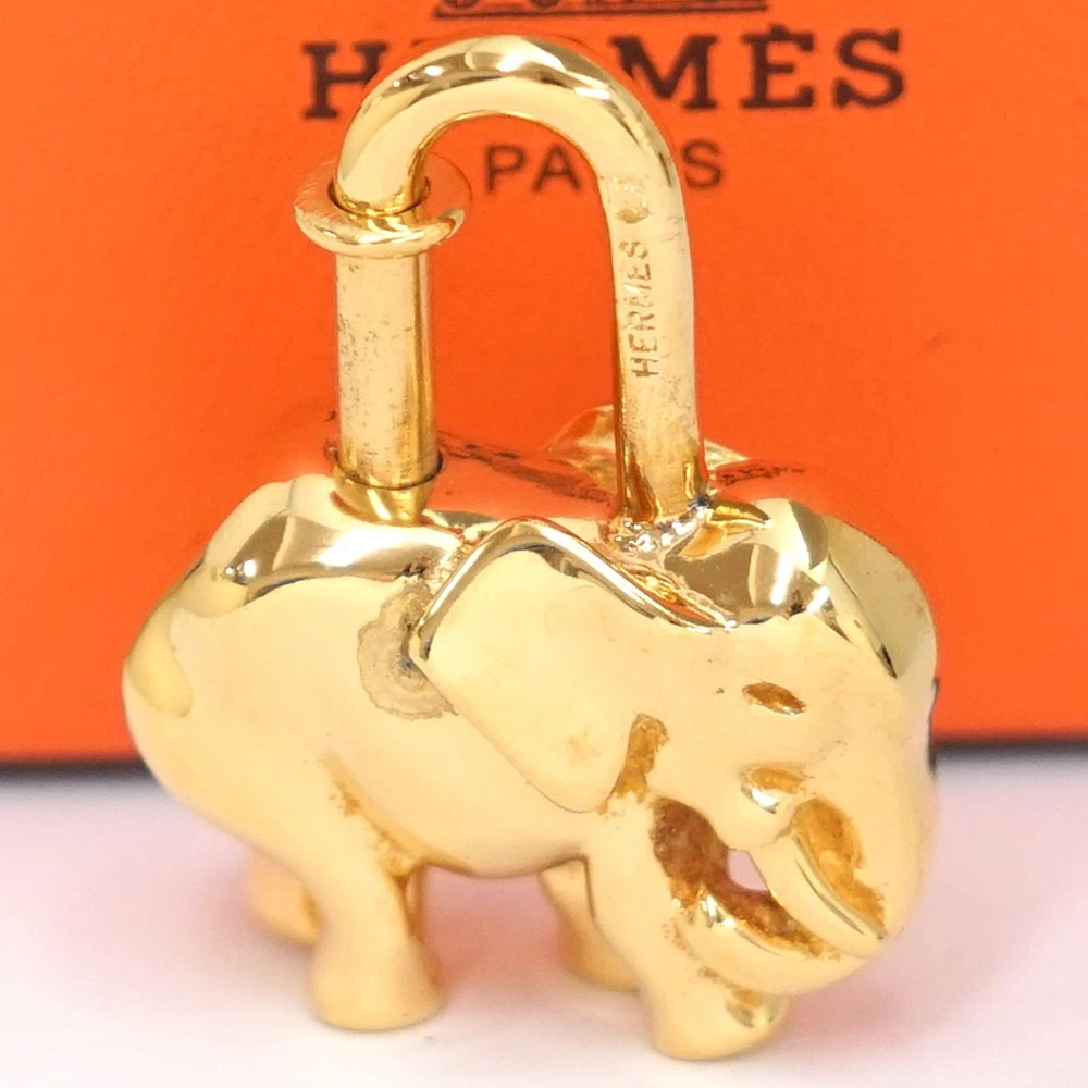 Hermès Elephant Motif Cadena Lock Bag Charm in Gold