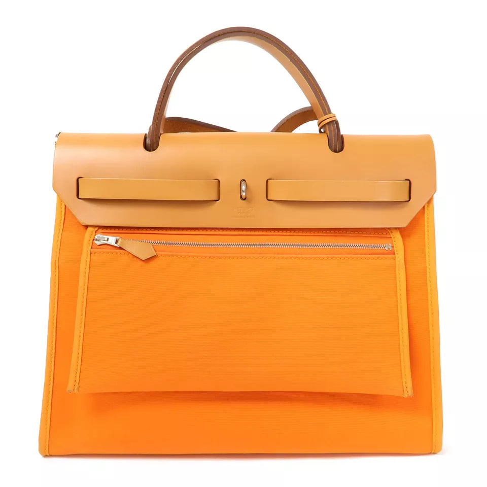 HERMES PHW Herbag PM is a versatile 2-way shoulder bag and handbag